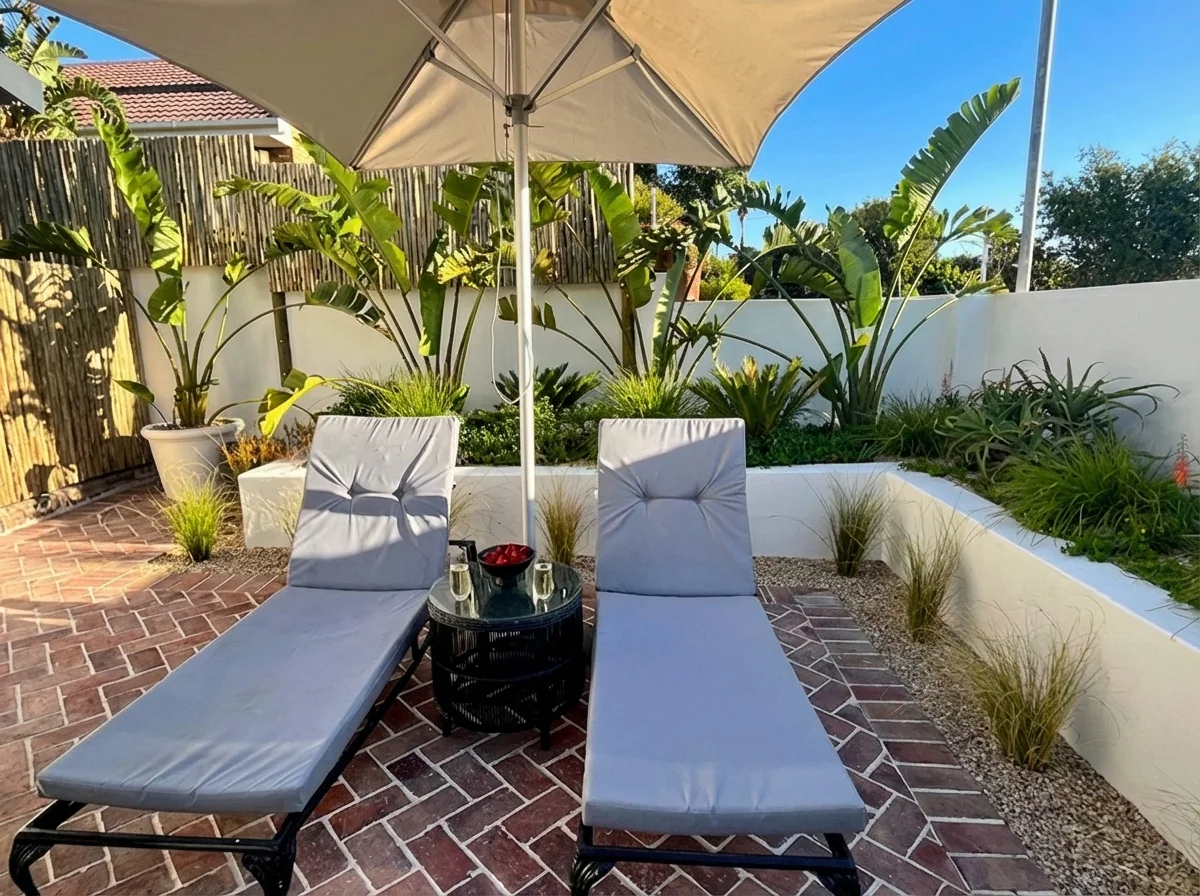Ibis Cottage patio lounge chairs set with champagne